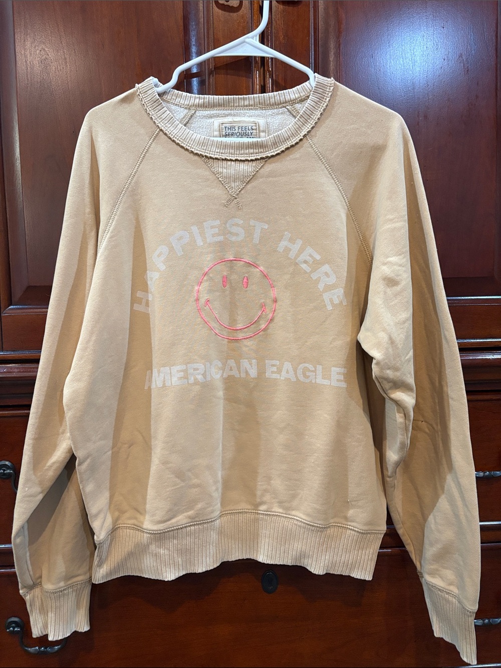 American Eagle Outfitters Tan Crewneck Sweatshirt with Pink Smiley Graphic